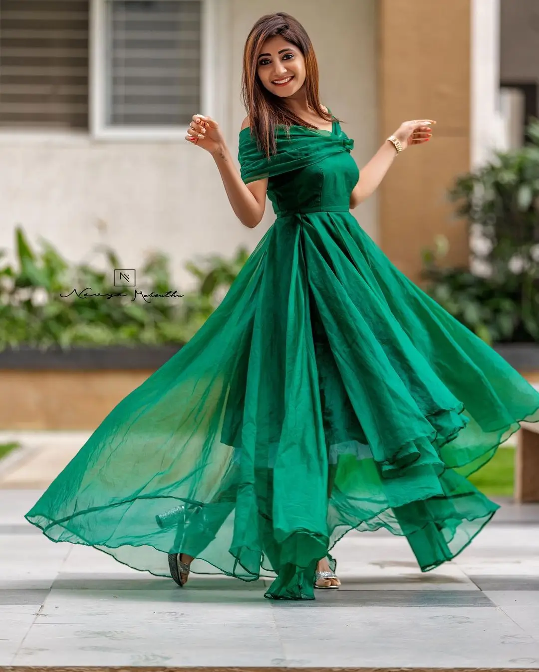 Vasanthi Krishnan Wearing Green Gown